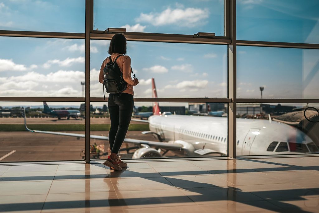 Gettyimages Woman Backpack Airport.jpg