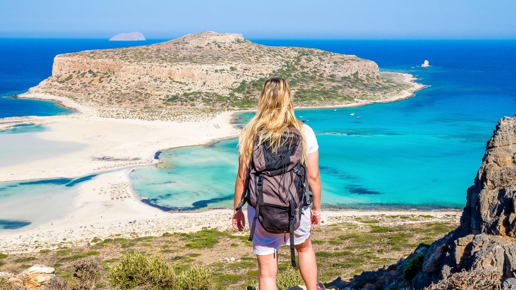 Woman Looking Over Balos Beach In Crete Greece Istock 1061642072.jpg