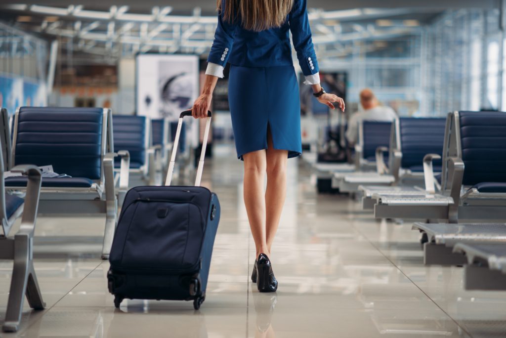 Flight Attendant Rolling Suitcase Airport.jpg