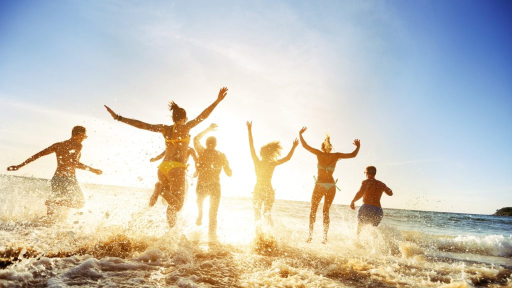 Crowd People Friends Sunset Beach Holidays Stock Photo.jpg