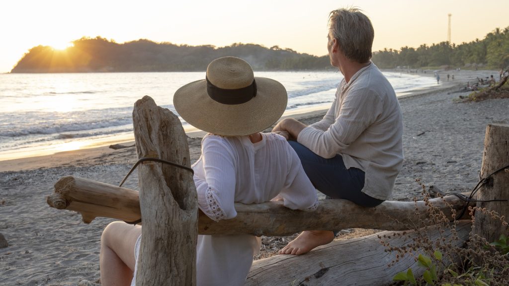 Mature Couple Relax Tropical Beach Sunrise Istock 1214579316.jpg