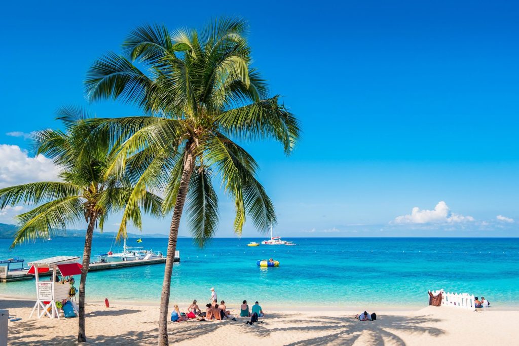 People Enjoy Doctors Cave Beach In Montego Bay Jamaica On A Sunny Day Gettyimages 1454721461 Ksedit.jpg