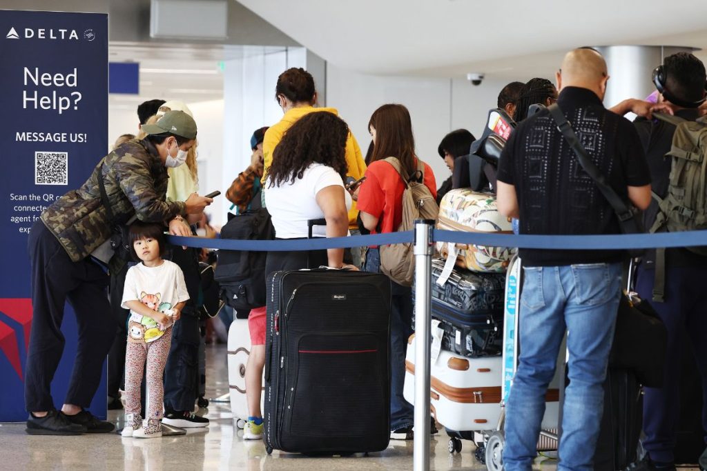 Travelers In Line At Airport.jpg