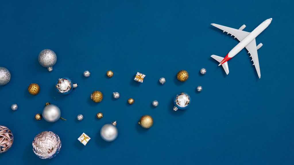 Winter Travel Toy Airplane And Ornaments.jpg